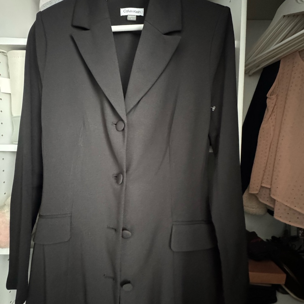Calvin Klein Women's long Black Blazer.  Could also be worn as a dress.